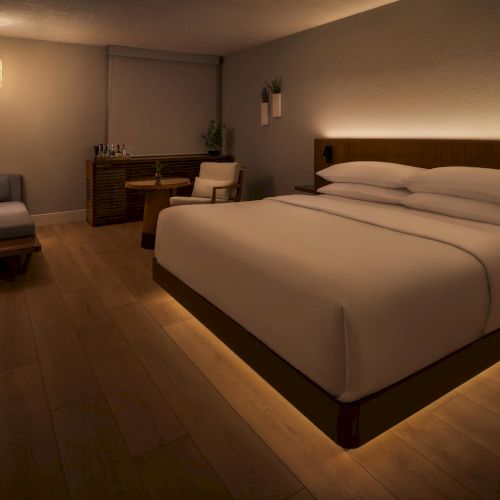 Composed view of a guest room at The Amaya featuring clean lines, warm textures, and soft daylight